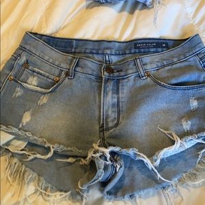 Size 28 distressed shorts